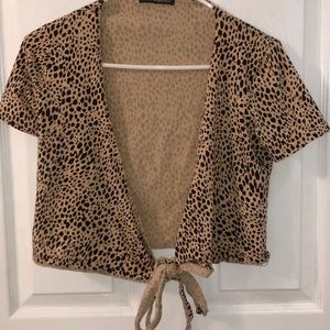 a cheetah print wrap top from brandy melville